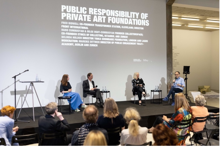 Symposium at Philara Collection, 4 speakers on a stage